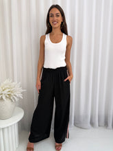 Load image into Gallery viewer, RAVING HEARTS PANTS - BLACK
