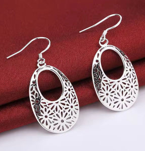 SILVER CARVED FLOWER EARRINGS