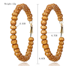 HOOP BEADED WOODEN EARRINGS - TAN